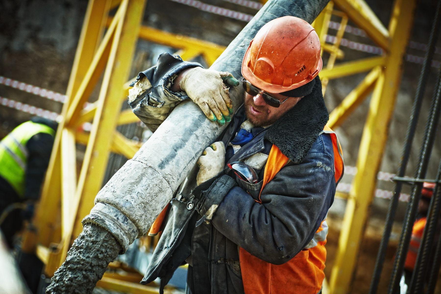 Concrete and site materials being worked on a construction job
